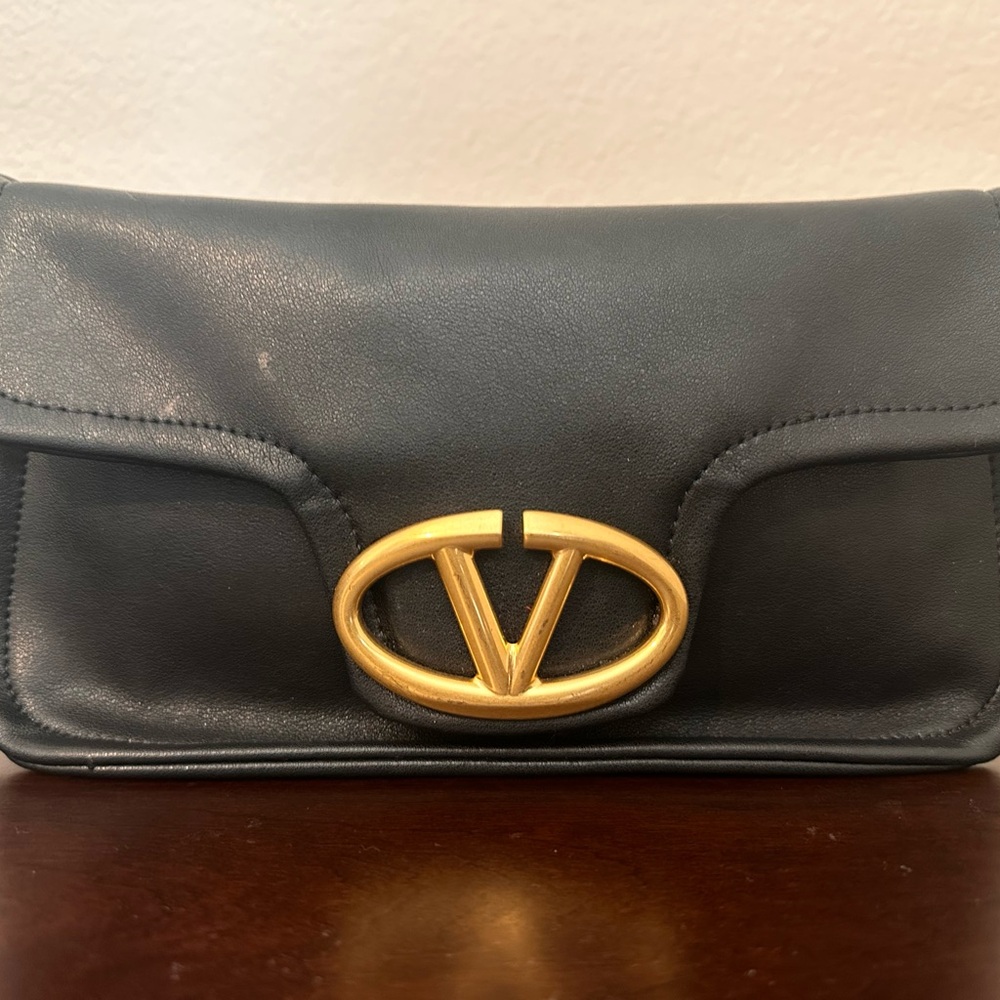 Elegant Black Leather Clutch with Gold Accent